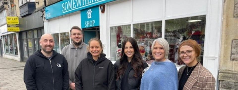 People stood outside a shop front in Weston-super-Mare